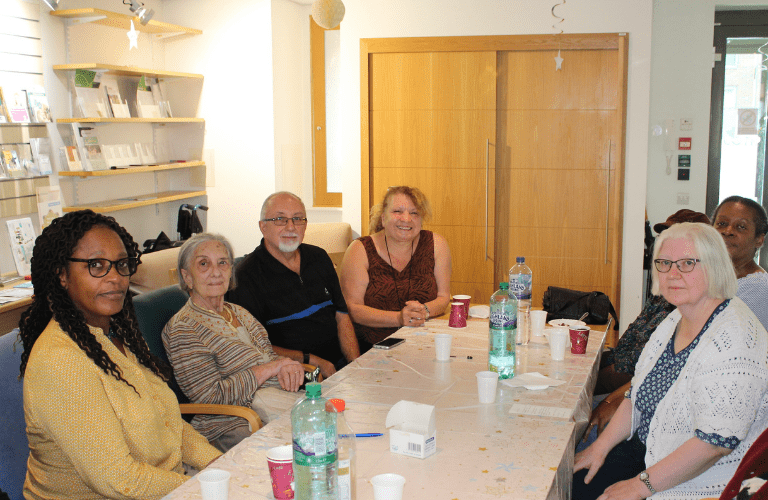 Carers and people with dementia celebrating the 10th birthday for Tom’s Club in August 2019