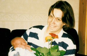 Anna with her first baby in 2001