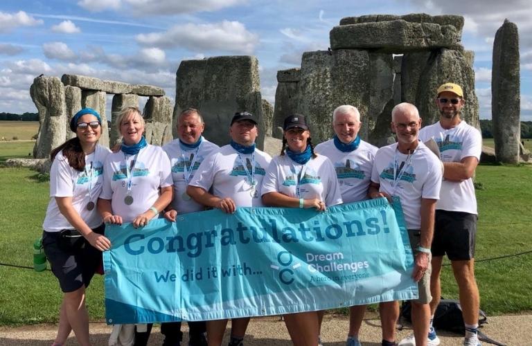 Gary and his friends pose at Stonenhenge at the end of the Chiltern Challenge