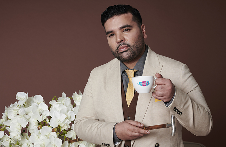 Naughty Boy poses as Jay Gatsby to raise awareness of Dementia UK’s Time for a Cuppa campaign.