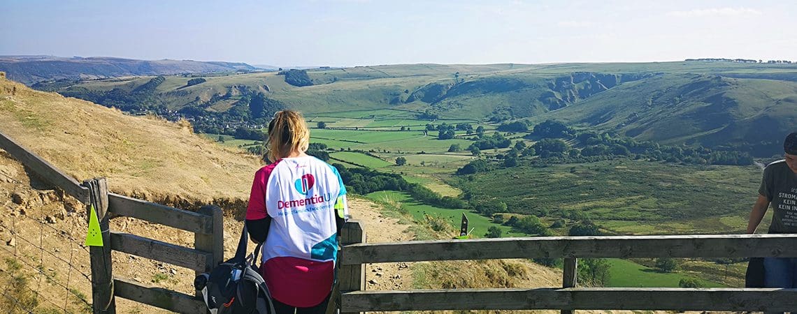 A woman walks the peaks