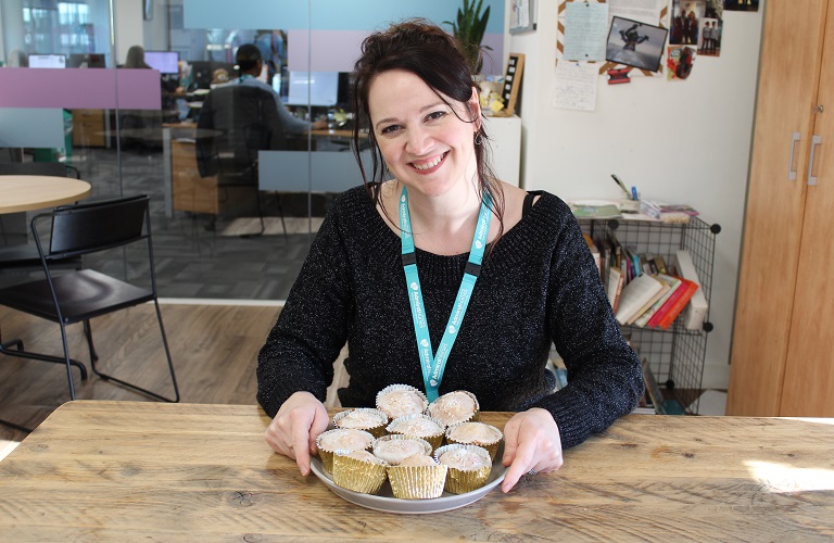 Vicky poses with her homemade cakes