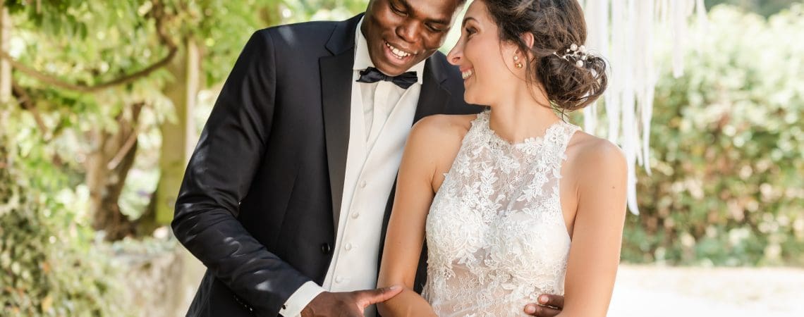 A couple share a moment on their wedding day