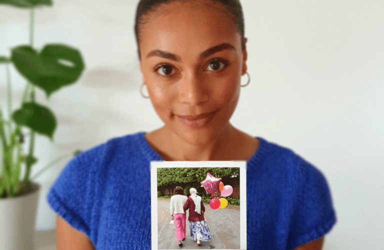 Adelle Tracey with a photograph of her grandmother.