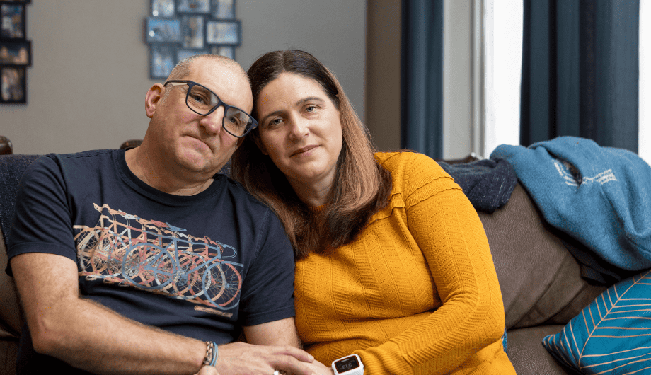 Andy (left) who has young onset dementia with partner Christine (on right)