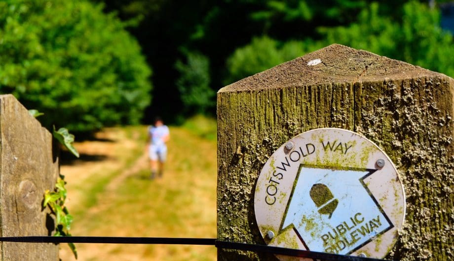 Fence post with directions to Cotswold way.