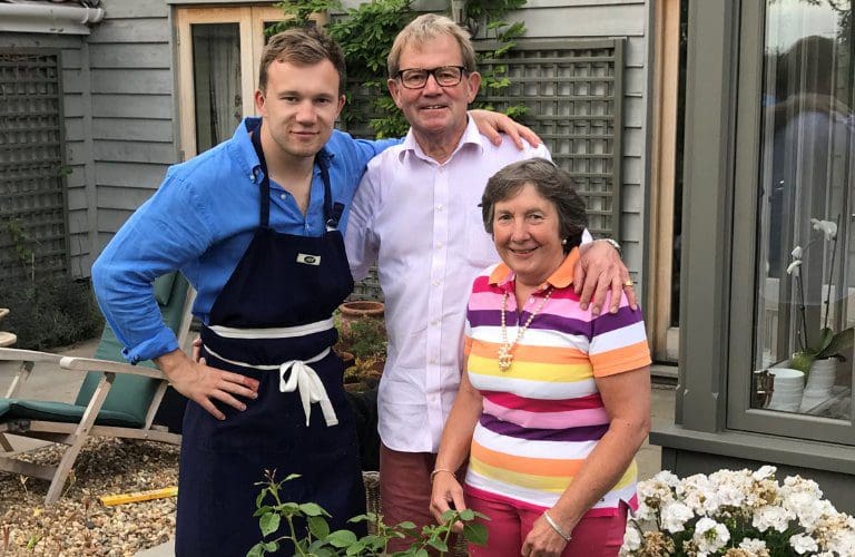 Outside the family home together in July 2018