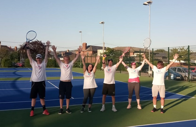 Steffan and friends in the tennis court