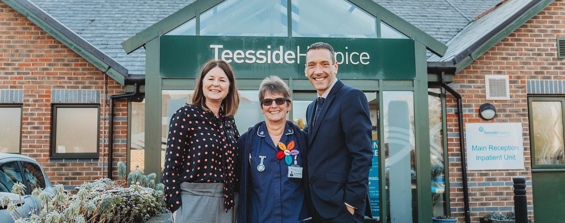Three hospital workers standing outside Teesside hospice