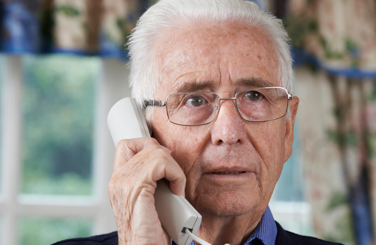 An older man on the telephone